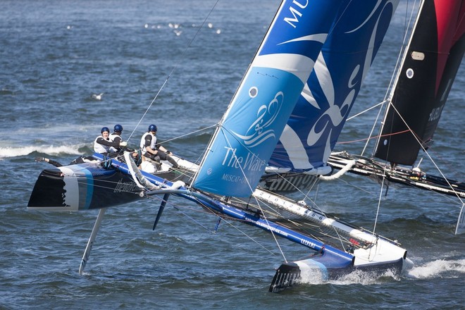 Act 4, Porto. Day 04. Images on the final day of racing, showing The Wave Muscat, skippered by Leigh McMillan (GBR), with tactician Ed Smyth (NZL), mainsail trimmer Pete Greenlagh (GBR), headsail trimmer Bleddyn Mon (GBR) and bowman Hashim Al Rashdi (OMA)- Extreme Sailing Series 2012 © Roy Riley / Lloyd Images http://lloydimagesgallery.photoshelter.com/